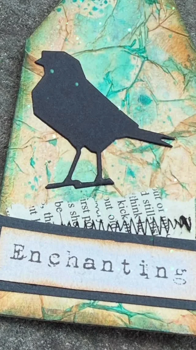 ✨A little peek at today’s paper play…✨
I’ve been a busy creator making this set of grungy, mystical tags using tissue paper, Salvaged Patina Distress Ink, and some of my favorite Tim Holtz die cuts. The texture turned out beautifully crinkled, with inky layers and stitched scraps adding that extra dose of whimsy.

Each tag is a tiny mood—Mystical, Whimsical, Enchanting, Intricate… simple little pieces that capture a feeling or a flicker of inspiration.

Hope this inspires you to pull out your scraps and get a little messy 💙🐦‍⬛#junkjournaling  #junkjournalideas  #hitherandyonstudio  #birdtags #inkyart #junkjournalbeginner #diyephemera